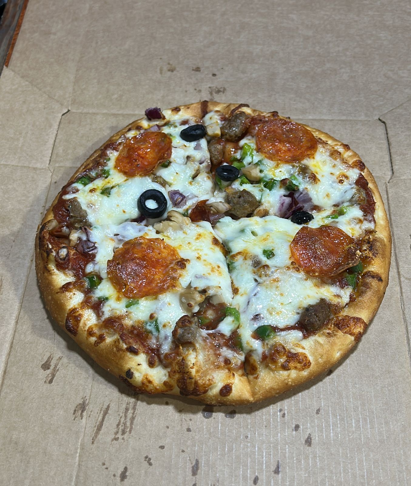 Pizza Personal Deluxe + Bebida